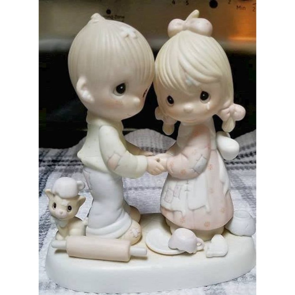 Forgiving is Forgetting Precious Moments Figurine
